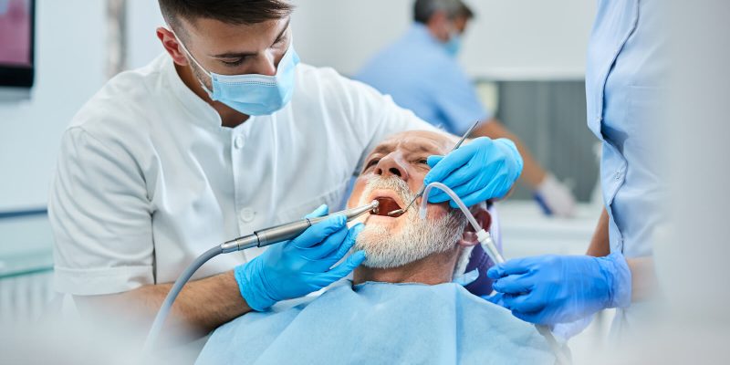 senior-man-having-teeth-polish-procedure-during-ap-2022-11-09-03-48-34-utc